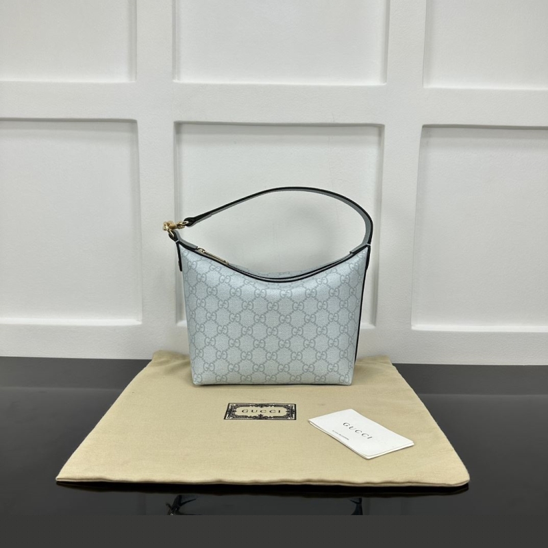 G*u*i top handle bags